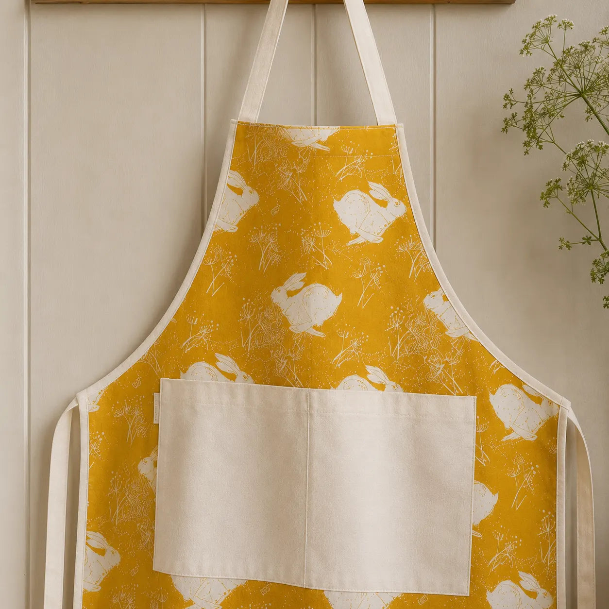 Sam Wilson Headlong Hare Yellow Ochre Apron - Zoomed