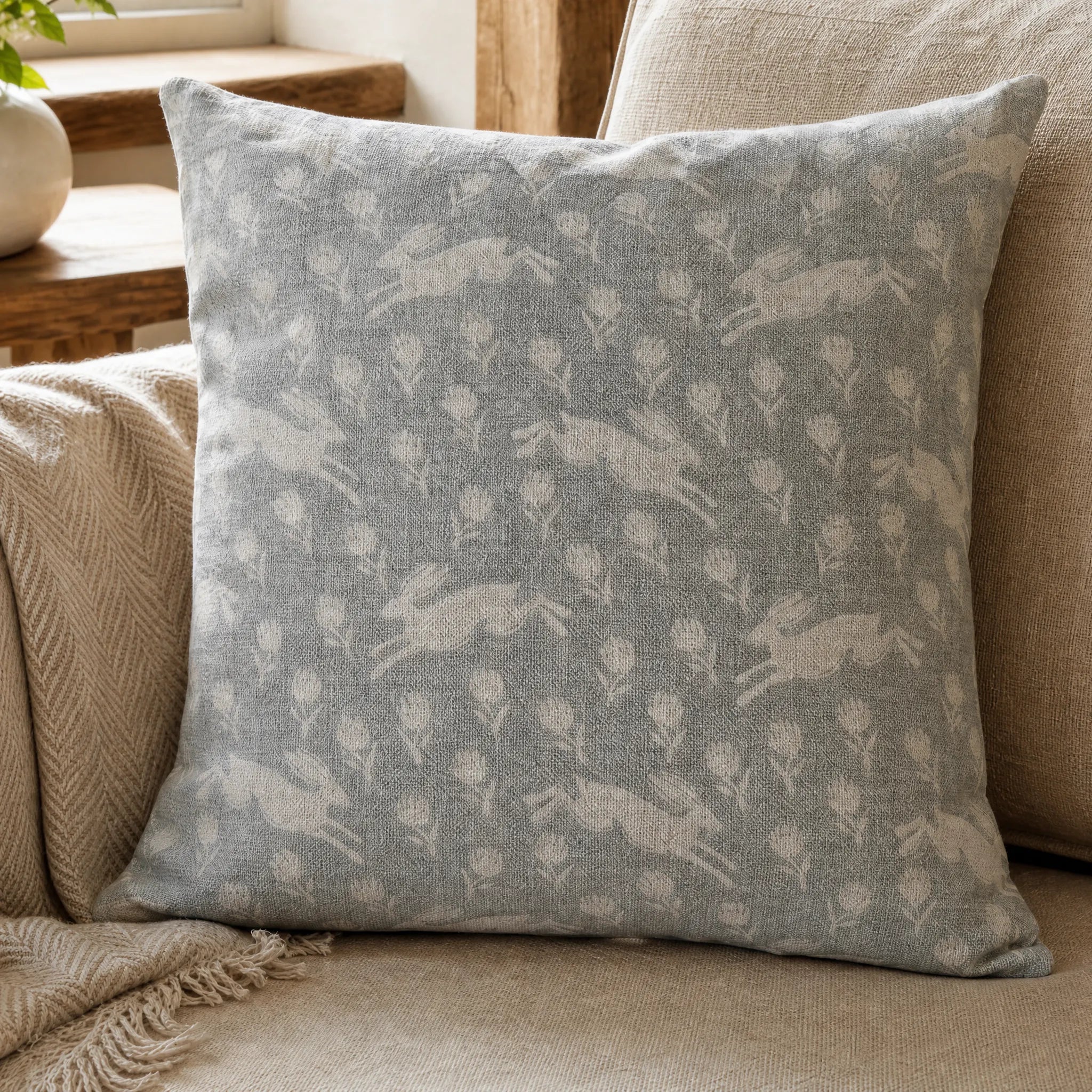 Sam Wilson Running Hare White On Grey Linen Cushion