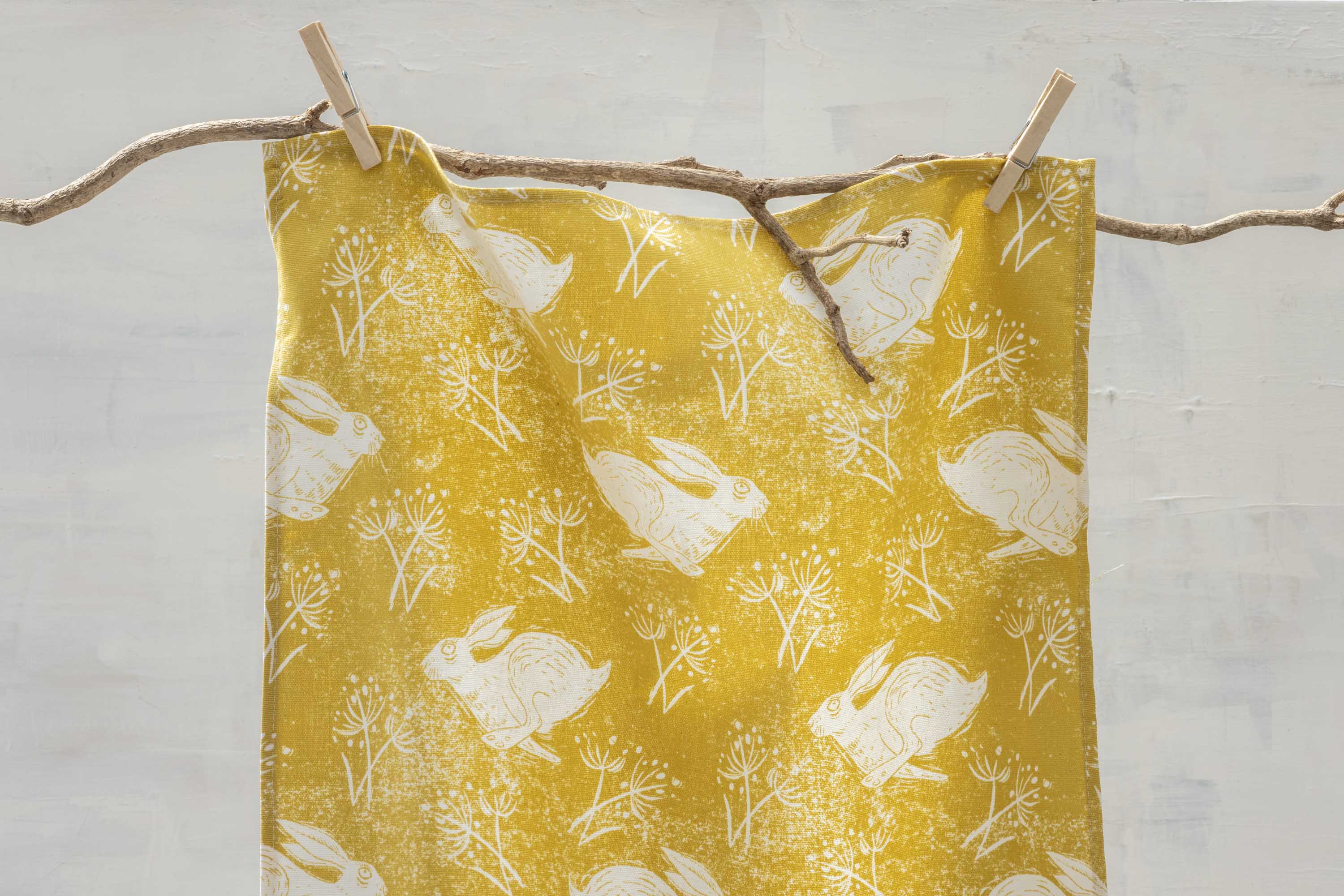 Sam Wilson Headlong Hare Yellow Ochre Cotton Tea Towel