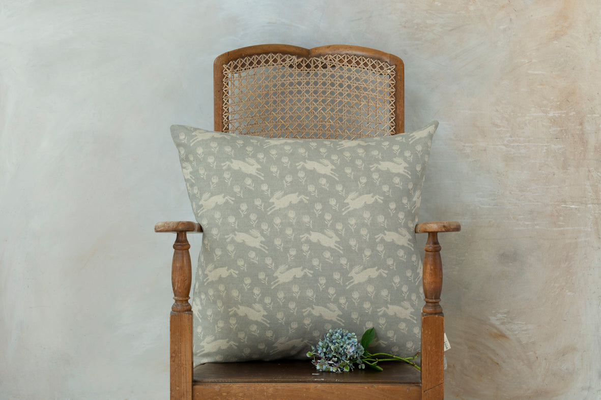 Sam Wilson Running Hare White On Grey Large Linen Cushion